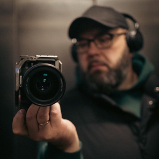 Человек с фотоаппаратом